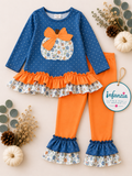 Blue Top W/White Polka Dot & Ruffle Hem and Orange Pants.